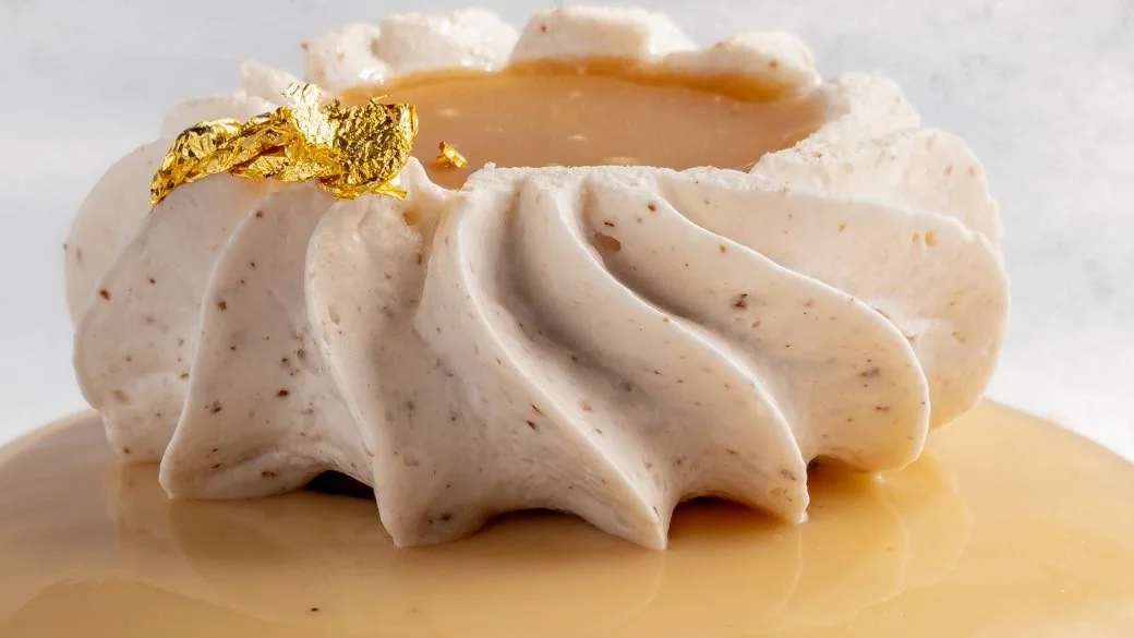 The piped cream on the Caramel Pécan, very close